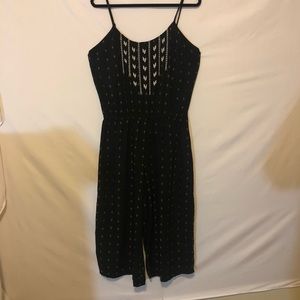 Navy blue spaghetti strap jumper.